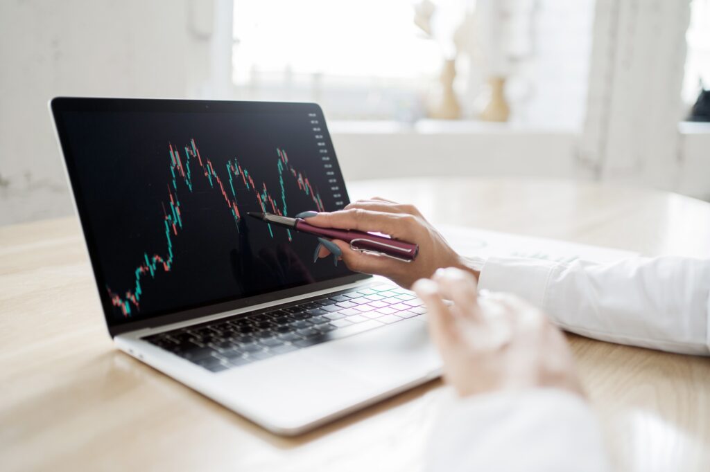 Broker stock trading online stock exchange on a laptop screen in the office.